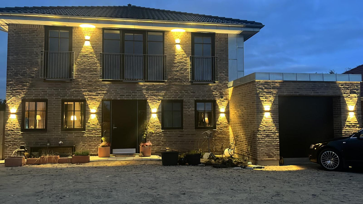 Avelira | Modern Up Down LED Outdoor Wall Light with Sandblasted Black Aluminium and 3000K Warm Light